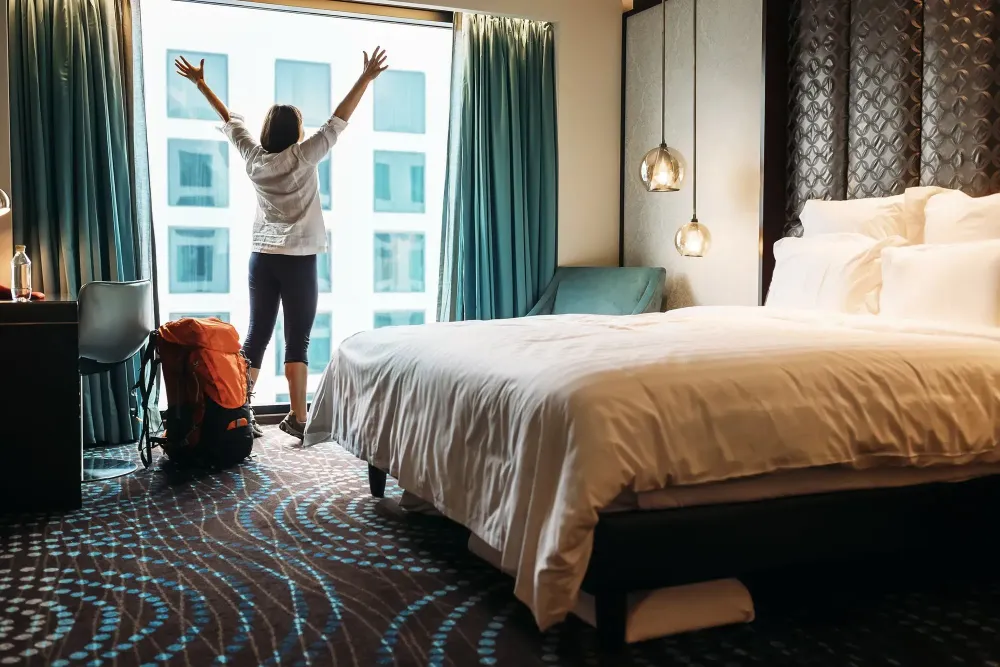 backpacker in nice hotel room